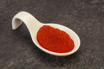 Dry paprika powder in the bowl