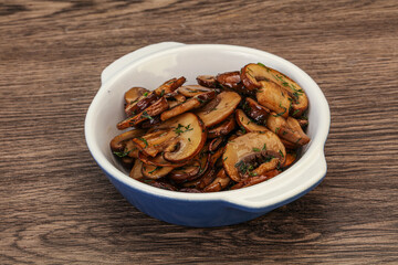 Roasted champignon with herbs and spices