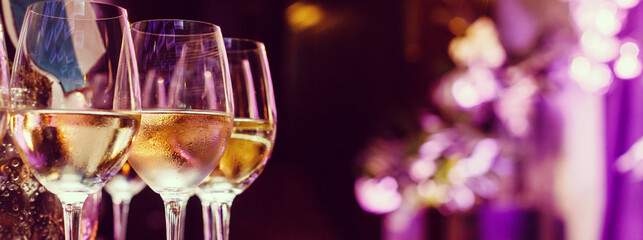 glasses with white and red wine close-up before party in cafe