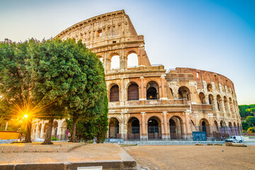 Naklejka premium Colosseum in Rome and morning sun, Italy, Europe