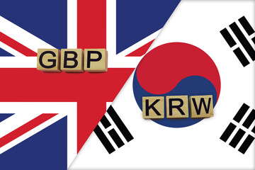 United Kingdom and South Korea currencies codes on national flags background