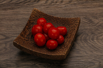 Pickled cherry tomatoes in the bowl