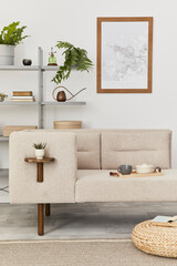 Cozy interior with stylish sofa, design coffee table, bookcase, plants, carpet, decoration, mock up poster map and elegant personal accessories. Neutral living room in classic house. Template.