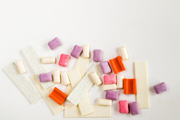 Different chewing gums on the white background