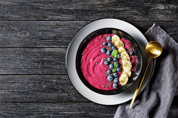 Smoothie bowl of blueberry and banana with yoghurt