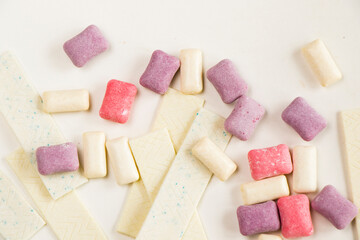 Different chewing gums on the white background