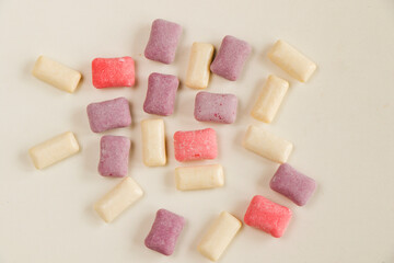 Different chewing gums on the white background