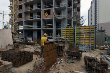 Residential building frame. Construction phase. Energy saving. Production of apartments, social...