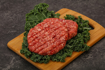 Raw beef burger cutlet for cooking