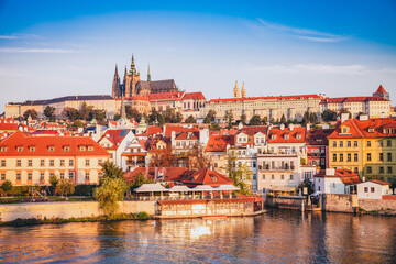 Fototapeta na wymiar Morning view of colorful old town and Prague castle with river Vltava, Czech Republic
