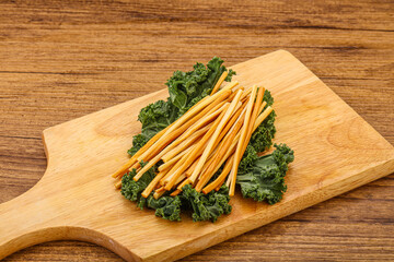 Chechel cheese sticks over board