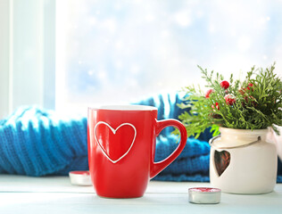Winter concept,mug on window sill,christmas decorations empty copy space.Valentines day banner.