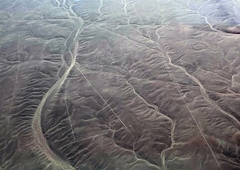 Nazca Lines Geoglyph Monkey in Nasca desert Peru, aerial view.