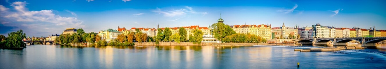 Fototapeta na wymiar Riverside panorama of Prague in Czech Republic