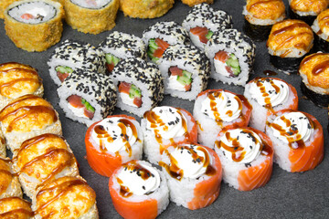 sushi rolls set on a stone for background