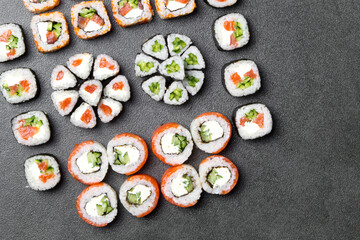 sushi rolls set on a stone for background