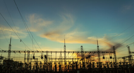 Electrical substation silhouette on the dramatic sunset background