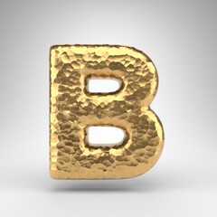 Letter B uppercase on white background. Hammered brass 3D letter with shiny metallic texture.