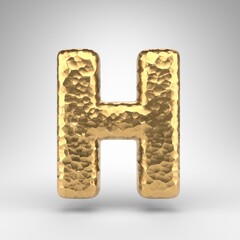 Letter H uppercase on white background. Hammered brass 3D letter with shiny metallic texture.