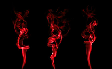 red smoke isolated black background	