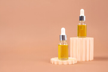 Mockup image of dropper bottle - natural organic cosmetics, hyaluronic acid, serum, moisturizer or facial anti-aging oil. Essential oil in trendy neutral still life composition. Modern apothecary