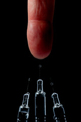 syringe isolated on black background