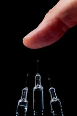 syringe isolated on black background