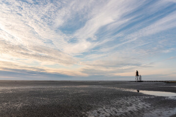 Wadden Sea with Lighthouse Obereversand in Dorum-Neufeld