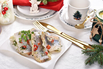 herring slices marinated in oil for Christmas