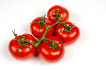 a bunch of large tomatoes on a white background