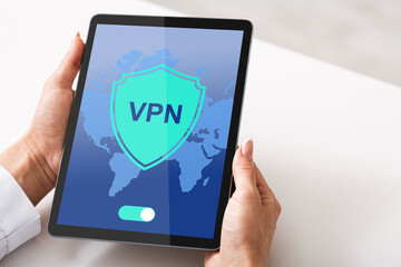 VPN Virtual Private Network App Opened On Digital Tablet In Female Hands