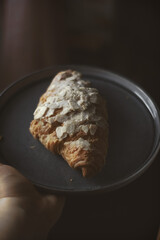 Almond croissant on a plate