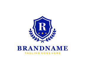 Shield logo. Letter R and shield vector logo design. R logo.