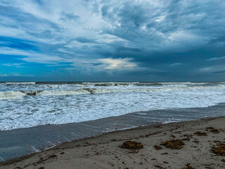 Waves breaking on shore