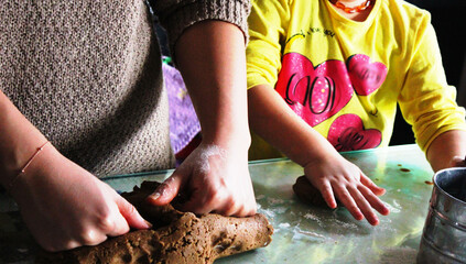 hands of a child hands of a person