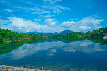 Fototapeta na wymiar Neyyar Dam beautiful lake , moudains and blue sky