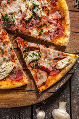 Italian pizza on wooden board