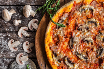 Italian pizza on wooden board