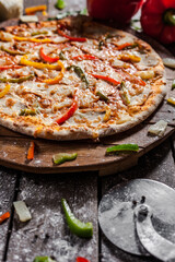 Italian pizza on wooden board