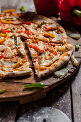 Italian pizza on wooden board