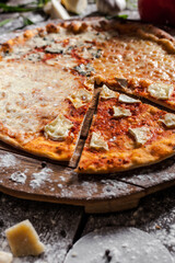 Italian pizza on wooden board