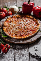 Italian pizza on wooden board