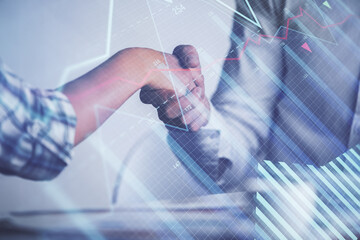 Double exposure of forex graph hologram and handshake of two men. Stock market concept.