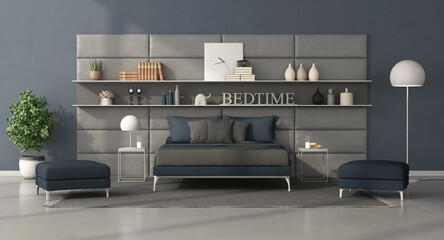 Modern bedroom with double bed in front of a leather panel with shelves