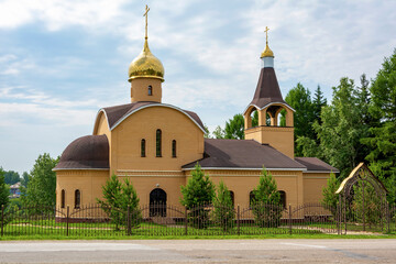 Fototapeta na wymiar Orthodox All-Holy Church in the village of Novonikolaevka