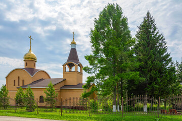 Fototapeta na wymiar Orthodox All-Holy Church in the village of Novonikolaevka