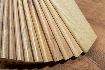 Skirting board background. Samples of Skirting board  with a pattern and wood texture for flooring and interior design. Production of wooden floors - obrazy, fototapety, plakaty