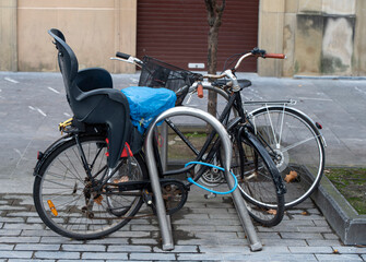 old bicycles abandoned on the street