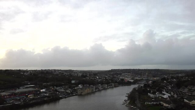 fly up the Truro river towards the cathedral at dusk cornwall England uk aerial drone 