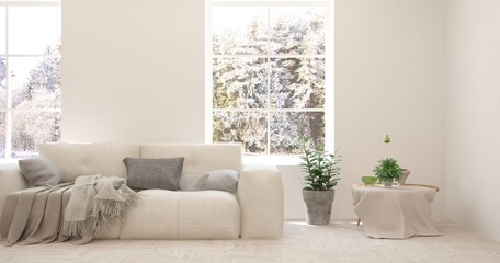Naklejka premium White living room with sofa and winter landscape in window. Scandinavian interior design. 3D illustration